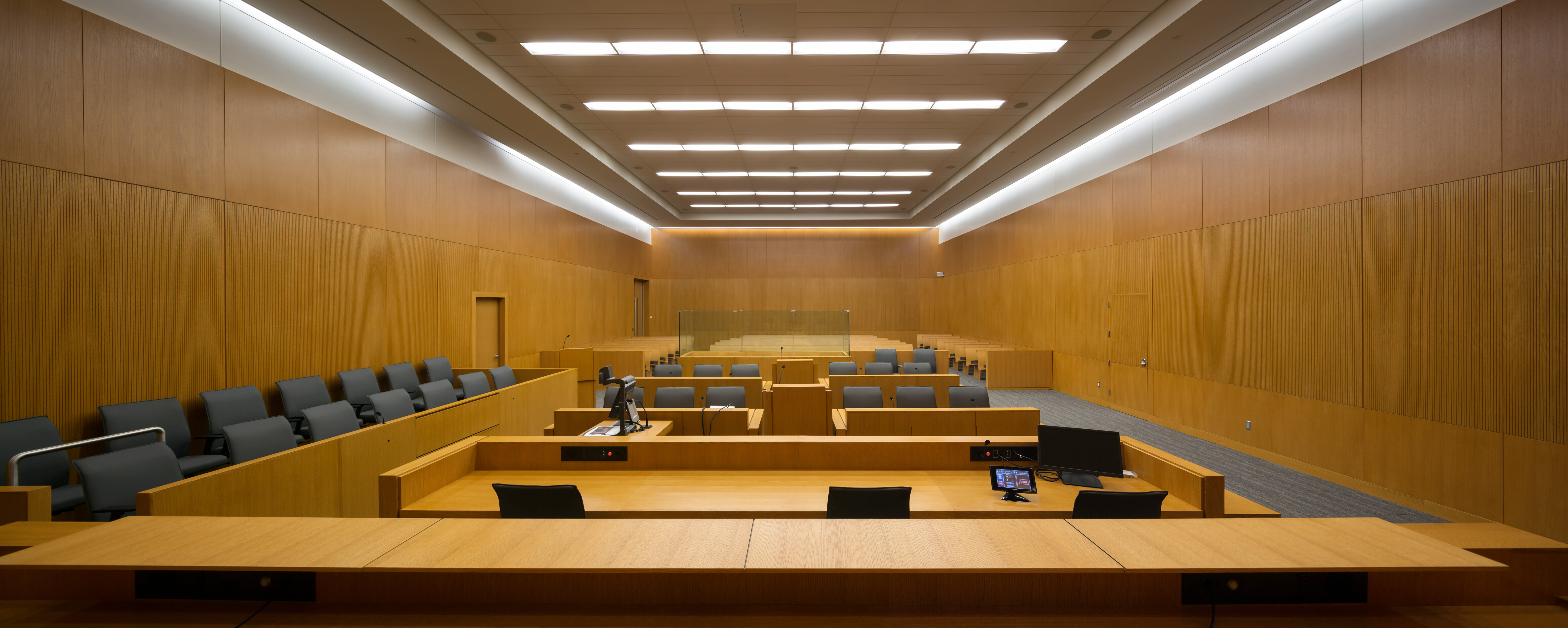 Large Loss Property Subrogation Image, Wide angle panoramic view of a new courtroom from the Bench
